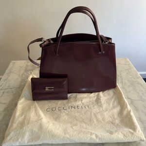 Coccinelle leather triple compartment handbag and matching wallet
